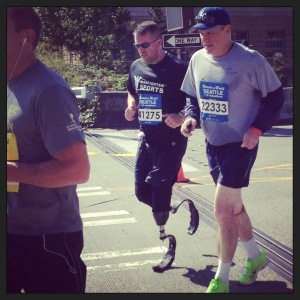 Man running on prosthetic legs